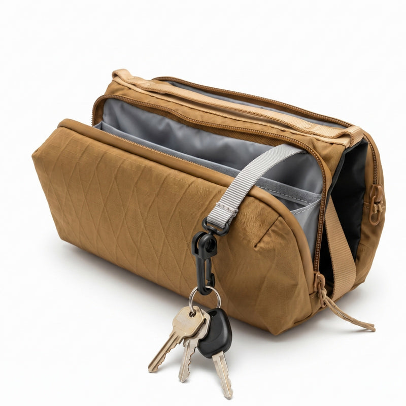 Laden Sie das Bild in Galerie -Viewer, ATEPA Rugged Mini Trail Sling Bag, 210D Ripstop Nylon Crossbody Pouch with Rope Strap, Dual Compartments & Bungee Storage Coyote Brown