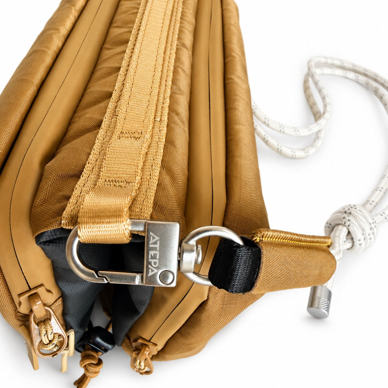 Laden Sie das Bild in Galerie -Viewer, ATEPA Rugged Mini Trail Sling Bag, 210D Ripstop Nylon Crossbody Pouch with Rope Strap, Dual Compartments & Bungee Storage Coyote Brown