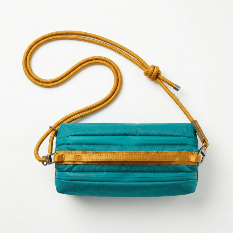 Laden Sie das Bild in Galerie -Viewer, ATEPA Rugged Mini Trail Sling Bag, 210D Ripstop Nylon Crossbody Pouch with Rope Strap, Dual Compartments &amp; Bungee Storage Alpine Teal
