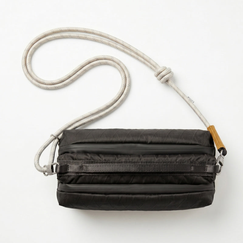 Laden Sie das Bild in Galerie -Viewer, ATEPA Rugged Mini Trail Sling Bag, 210D Ripstop Nylon Crossbody Pouch with Rope Strap, Dual Compartments &amp; Bungee Storage Obsidian Black
